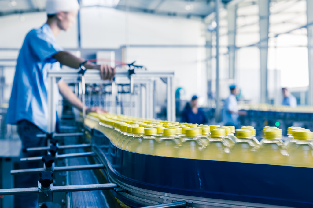 machine delviering bottles of liquid automatically