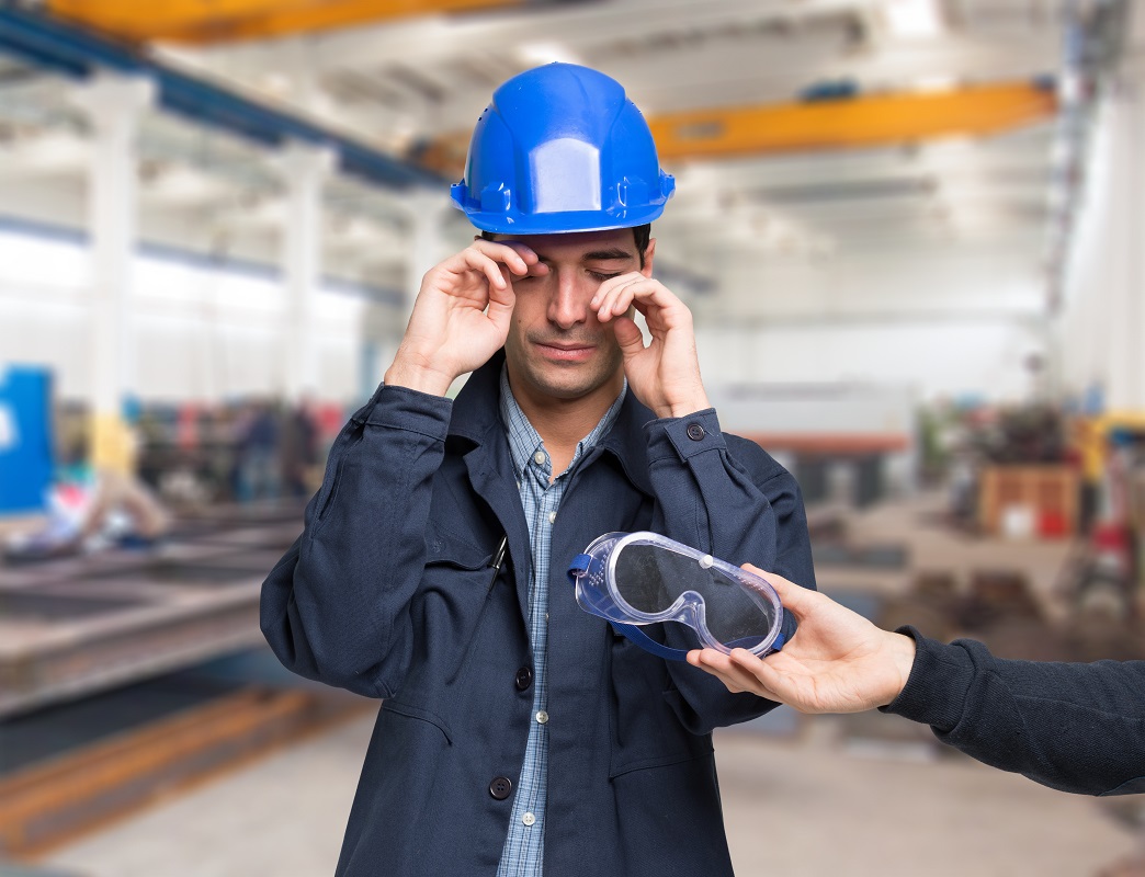 a person handing a goggles to a man