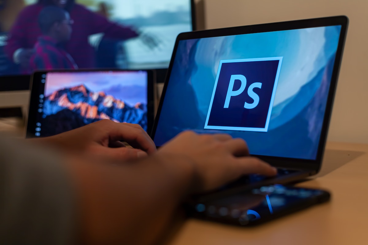 a person using adobe photoshop